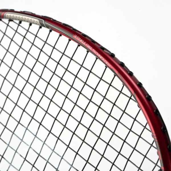RSL Gravite Play badminton racket – red upper-frame detail
